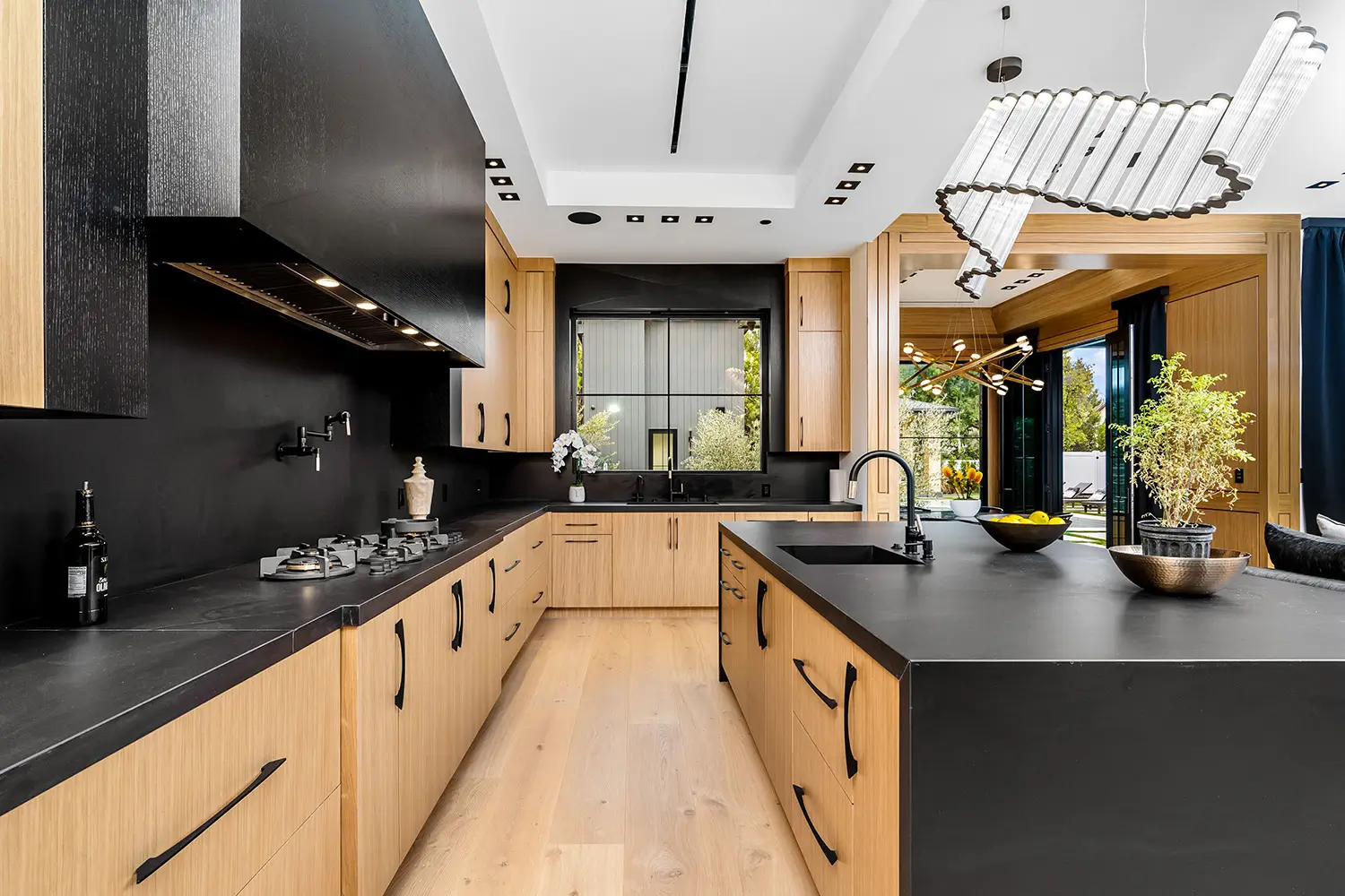 modern-kitchen-with-wooden-cabinets-and-black-coun-2025-02-10-06-40-18-utc